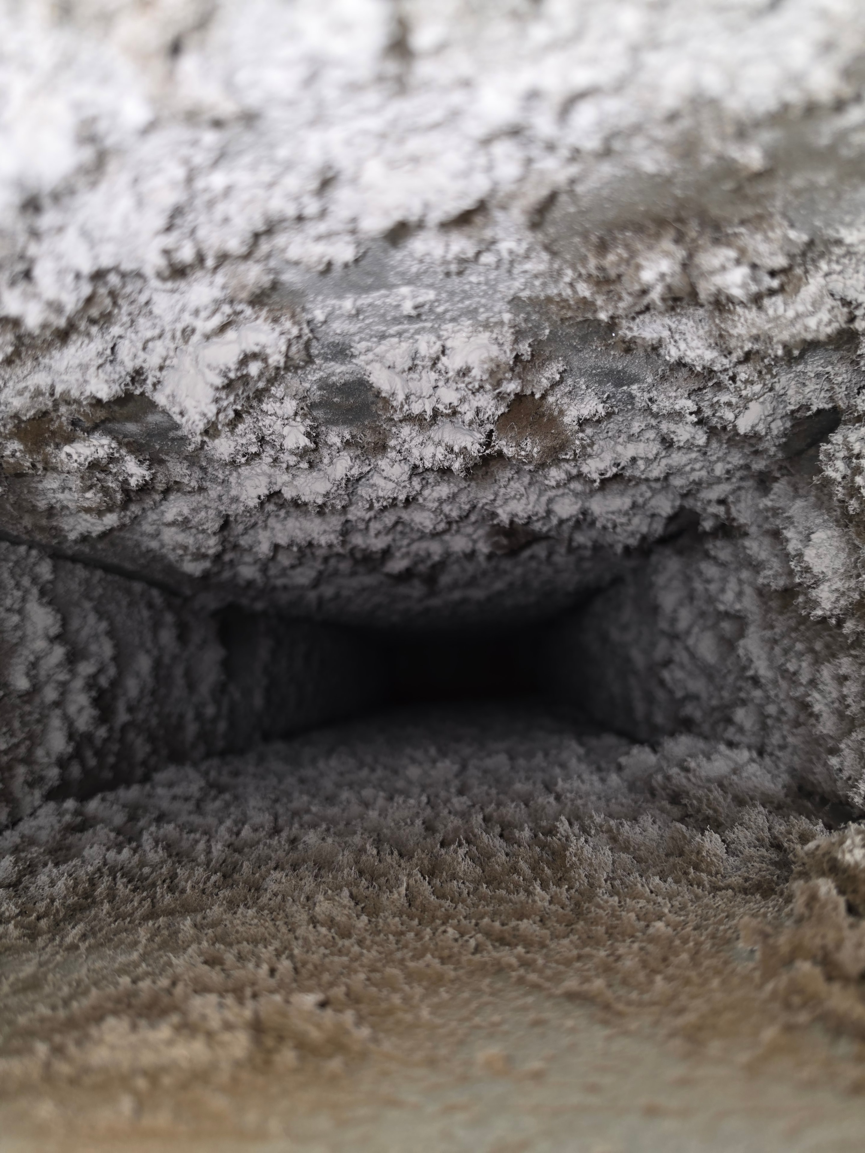 Air duct interior before cleaning — cigarette smoke damage, Brick, NJ rental property