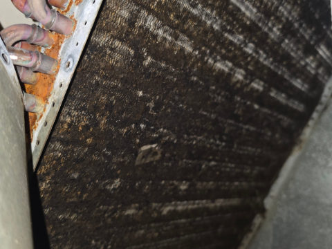 Heavily clogged evaporator coil before cleaning — Toms River NJ