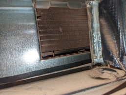 Before: coils are obstructed by stubborn buildup, necessitating specialized commercial air duct cleaning