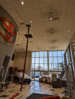 Ceiling has dirty air vents that need cleaning, second view